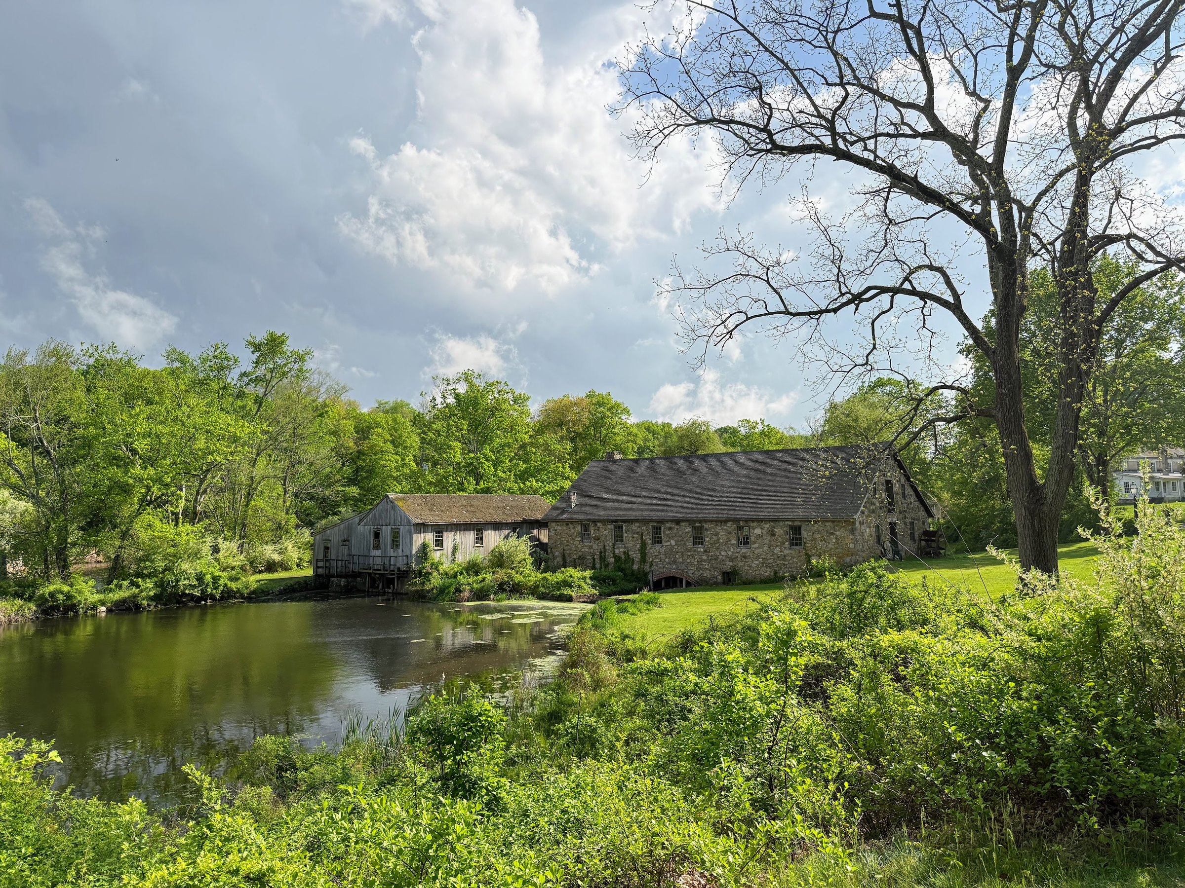 Historic stone grist mill beside a river in Northwest New Jersey